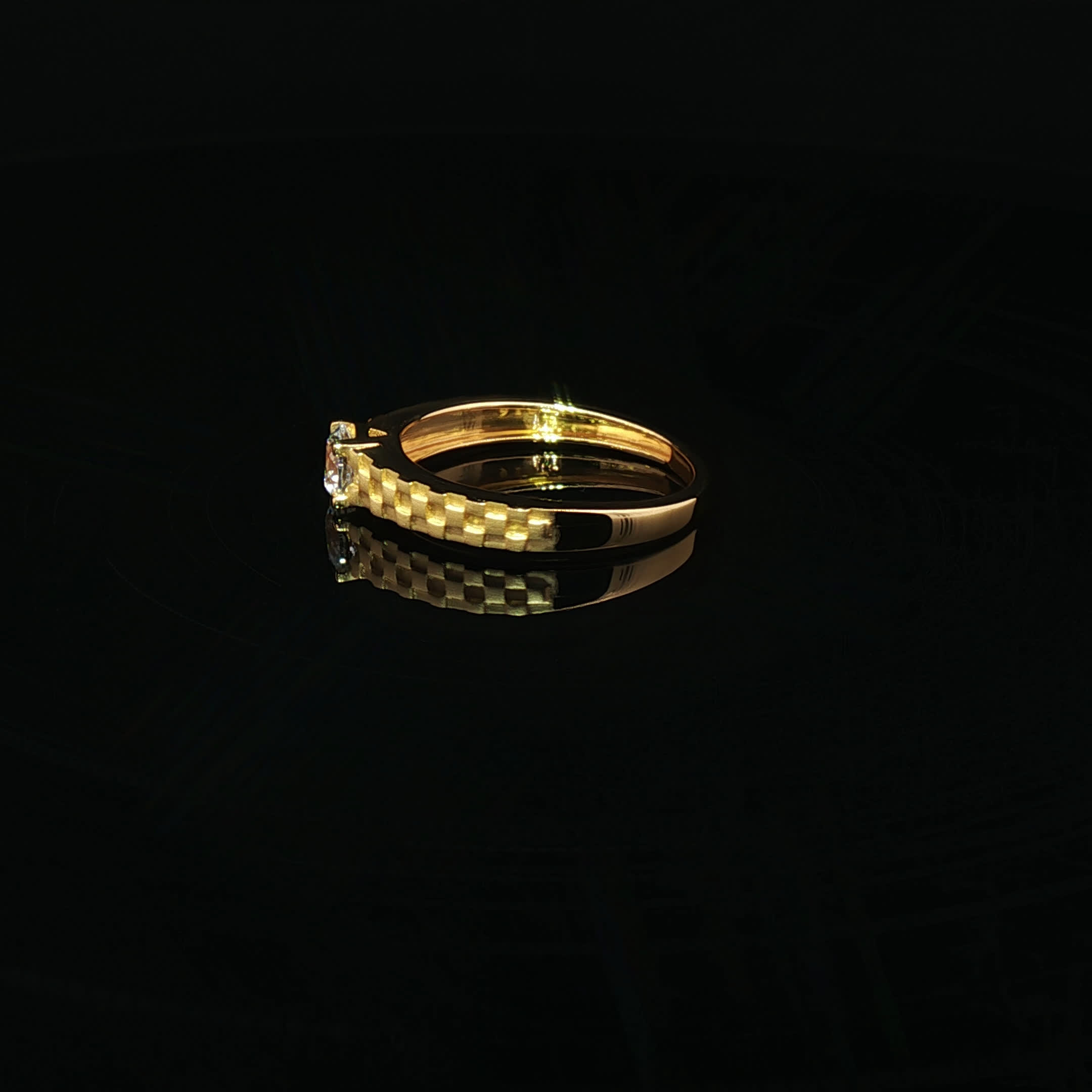 Second image of A classic solitaire, elevated in 22K gold